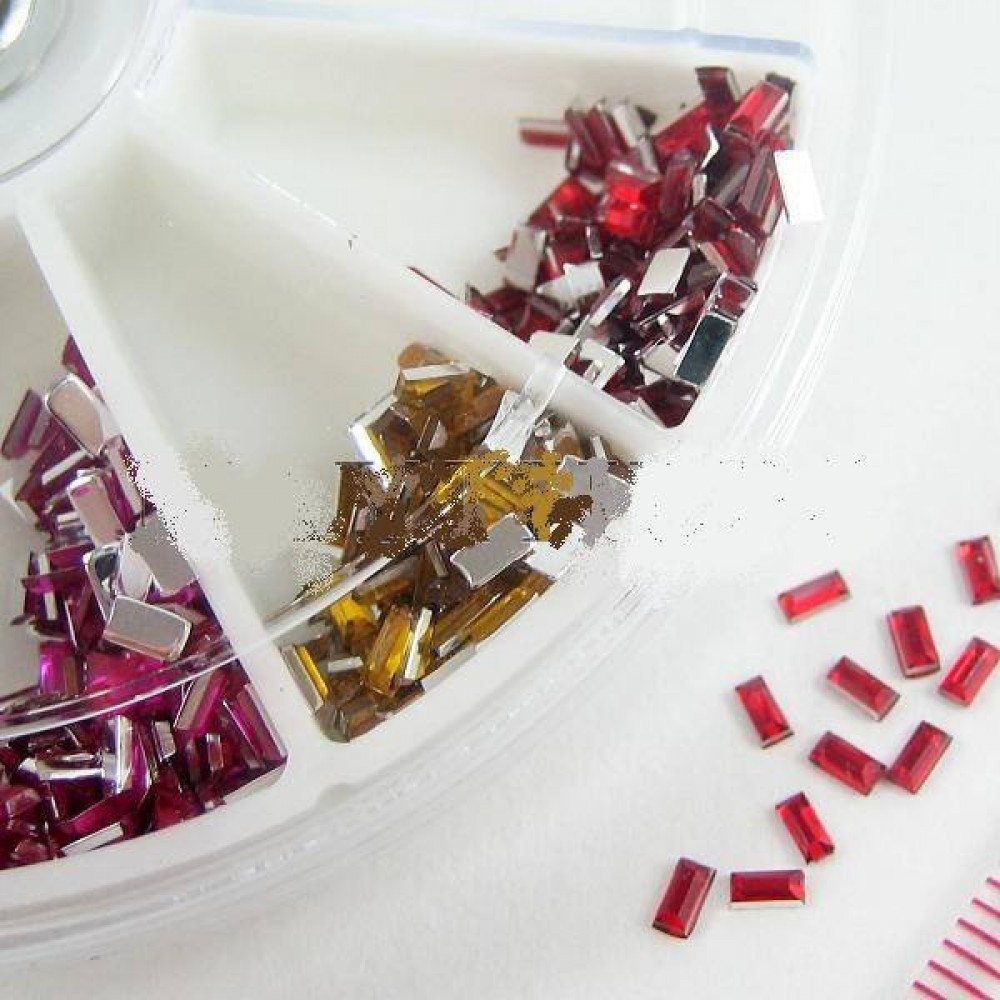 Декорация палитра Модел 32 - Правоъгълни кристали 12 цвята 1 x 3 мм Декорация палитра Модел 32 - Правоъгълни кристали 12 цвята 1 x 3 мм